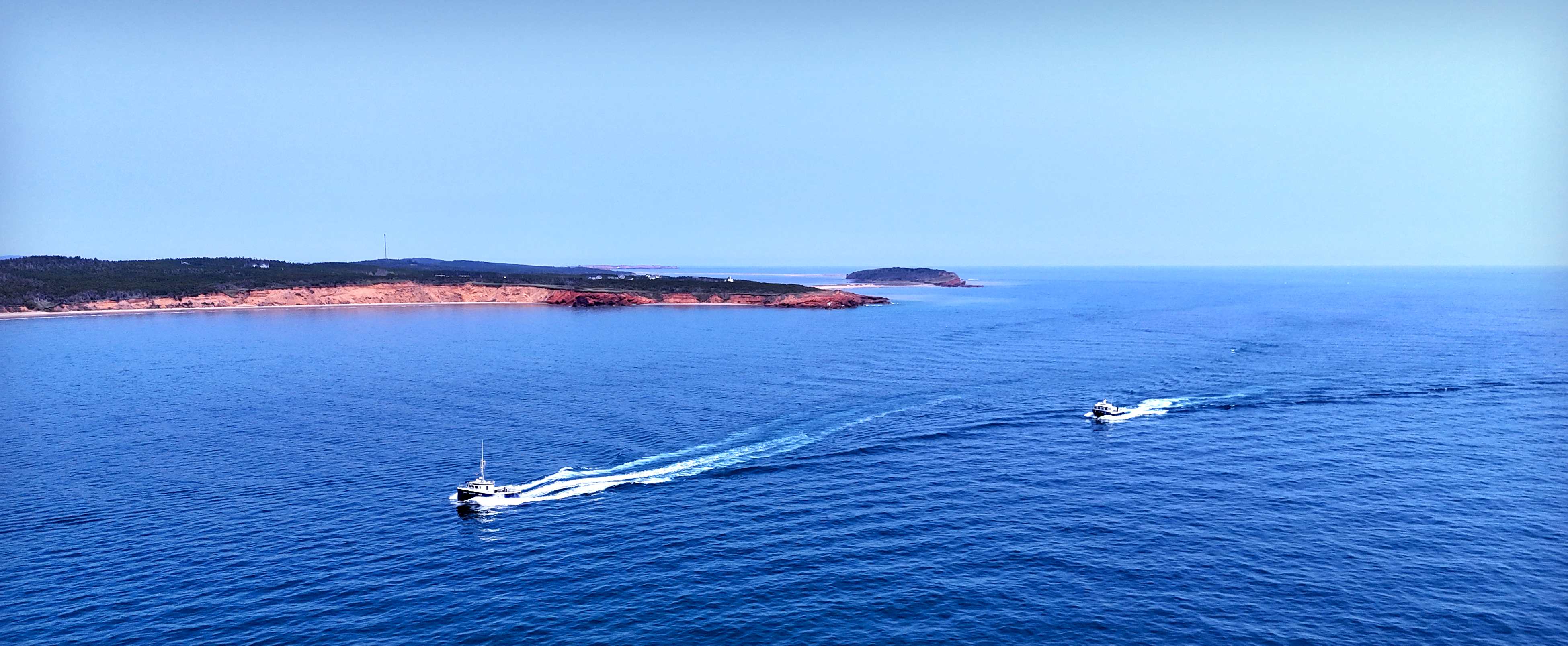 Magdalen Islands coastal scene with boats
